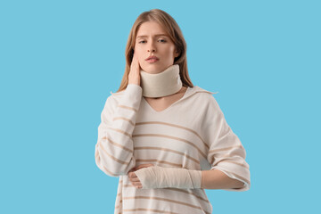 Poster - Injured young woman after accident with cervical collar on blue background