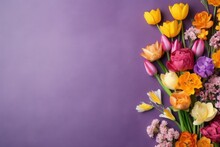 Creative Arts With Colorful Flowers On A Purple Background. Copy Space