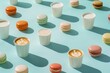 Pattern made of cups of coffee latte and colorful macarons on blue pastel background.	