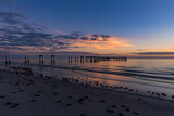 Fototapeta Konie - Evening light on the fishing pier in Fort Myers Beach.