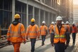 © free - Group of construction workers in safety suit and hat walking on city street