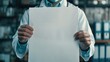 Doctor in Lab Coat Holding Blank Whiteboard with Copy Space, Ready for Medical Information or Advertisements