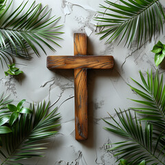 Wall Mural - A wooden cross is placed on a wall with green leaves