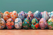 A large collection of Easter eggs, decorated with colorful flower paintings, exhibits light red and indigo hues, optical art, and folkloric elements in light azure and dark amber.