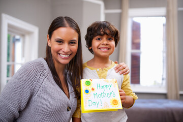 Sticker - Child, mom and portrait with card for mothers day, surprise and appreciation for love and kindness. Indian people, parent and boy with smile and joy with gift for giving, celebrating and childhood