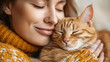Woman in a cozy sweater snuggling with a ginger cat, depicting affection and comfort.