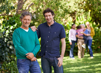 Poster - Portrait, dad and man with embrace for bonding, affection and love to relax in garden, backyard and nature. Male people, family and men with smile, happiness and together outdoor with relatives