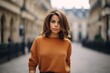 Outdoor portrait of beautiful young woman in the streets of Paris.
