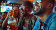 A group of friends cheering and laughing while watching sports in a bar, holding beer glasses with their hands up, enjoying each other's company together on game night
