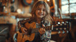 Smiling young girl playing guitar indoors
