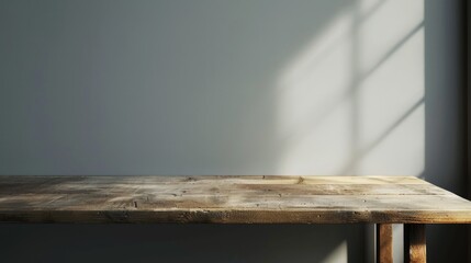 Poster - A simple wooden table placed in front of a window. Suitable for home decor or interior design concepts