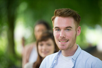 Portait of a small group of adults.