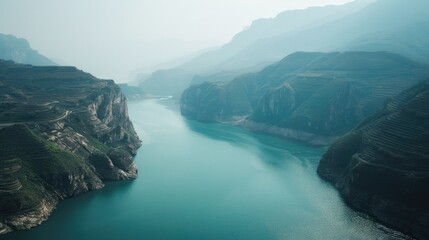Poster - Scenic view of a large body of water surrounded by mountains. Ideal for travel brochures