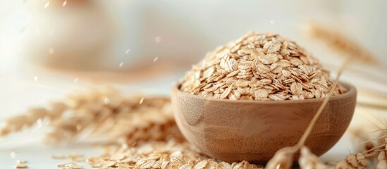 Poster - A rustic wooden bowl filled with oats placed on a wooden table, with a warm and inviting color palette