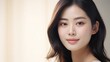 © Zainab - Japanese 30-40 years old woman with smooth healthy face skin. Skincare commercial portrait. Chinese, Korean asian woman touch face. Beauty and cosmetics skincare advertising concept