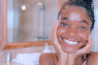 Bantu woman wash her face with facial foam and water, beauty skin care