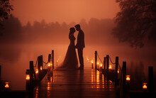 Married Couple On A Pier At Night.