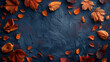 A vibrant bunch of leaves scattered on a serene blue surface, creating a cheerful and festive Thanksgiving scene