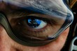 closeup of eyes with reflection of earth, skydiver wearing goggles