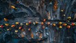 Aerial view of coal mine operation with workers in reflective clothing