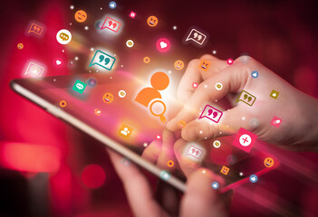 Aufkleber - Close-up of a hand using tablet with social media icons