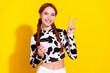 Photo of good mood funky lady dressed cowskin print top showing v-sign enjoying tea isolated yellow color background
