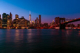Fototapeta  -  Brooklyn Bridge with lower Manhattan skyline in New York City at night, USA. Long exposure at night