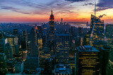 Fototapeta  - New York Manhattan view from One World Trade Center. sunset view with financial buildings city light. Empire State building on sunset 