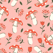 Seamless vector pattern with amanita, red flowers and leaves. Pink background with mushrooms and tulips. Hand drawn cotagecore texture for wallpaper, wrapping paper, textile design