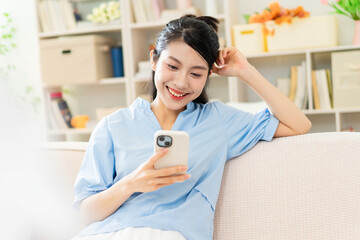 Canvas Print - Photo of young Asian girl at home