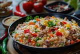 Fototapeta Tulipany - Fried rice with vegetables and meat in a frying pan