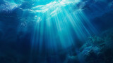 Fototapeta Do akwarium - Underwater Serenity: Sunlight Piercing Through Ocean Depths