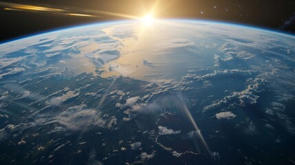 Wall Mural - the sun is brightly shining over planet earth, casting a warm glow on its surface. the earth appears