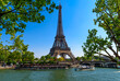View of Eiffel Tower and river Seine in Paris, France. Eiffel Tower is one of the most iconic landmarks of Paris