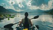 back view of a woman kayaking on the water in summer