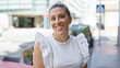 © Krakenimages.com - Young blonde woman smiling confident standing at street