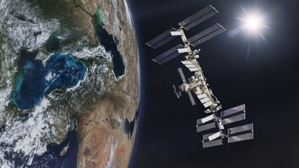Wall Mural - international space station on low-orbit of earth with rising sun. elements of this image furnished 