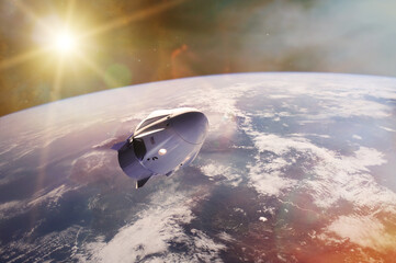 Wall Mural - cargo spacecraft in low-earth orbit with sunlight. elements of this image furnished by nasa.