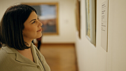 Wall Mural - Young beautiful hispanic woman visiting art gallery at Belvedere Palace in Vienna