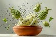 Levitating Green Milkweed Pods Bursting Open with Seeds Floating on Light Background