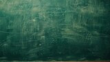Fototapeta Zwierzęta - Close-up view of blank green chalkboard in classroom setting, educational background for teaching and learning concepts, copy space available for text or graphics