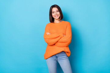 Wall Mural - portrait of attractive cheerful content girl folded arms posing wearing cosy clothes isolated over b
