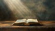 © Suleyman - An open Bible rests on a wooden surface, illuminated by a soft overhead light. This image evokes the concept of spirituality and faith.