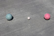 © Steve Samoyedny - Bocce balls encircling the starting and scoring white ball.