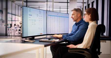 Analyst Working With Spreadsheet Business Data