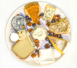 Cheese plate; Top view for traditional plate of various french cheeses