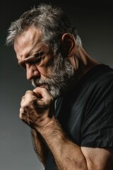 Poster - A man with a beard wearing a black shirt. Ideal for business or casual concepts