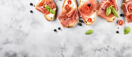 Wall Mural - Delicious bruschettas with prosciutto on marble table