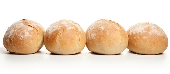 Sticker - Four bread loaves lined up on white surface