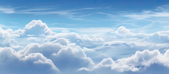 Wall Mural - an azure sky painted with fluffy cumulus clouds creates a picturesque natural landscape. the electri